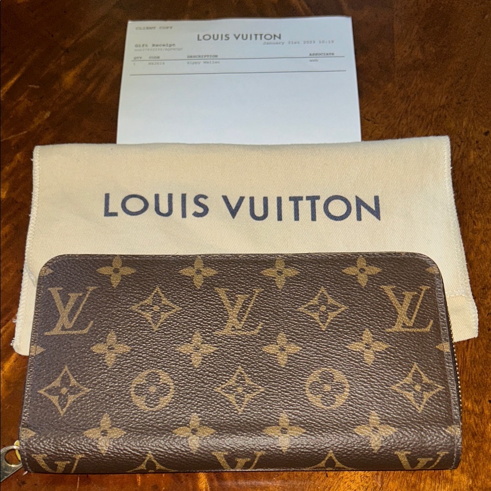 Sold Louis Vuitton Like New Zippy Wallet with receipt.
